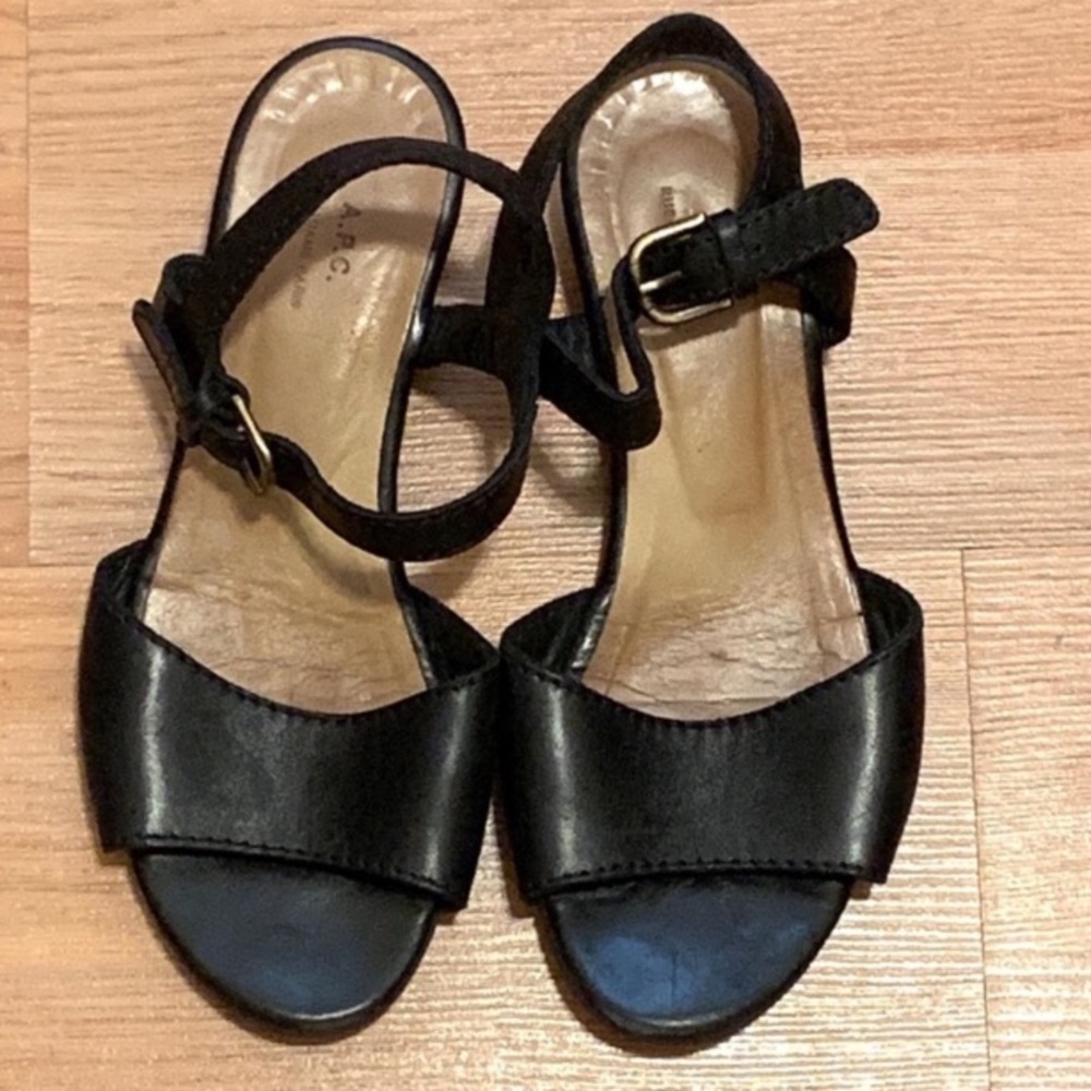 A.P.C black leather roma sandals.
